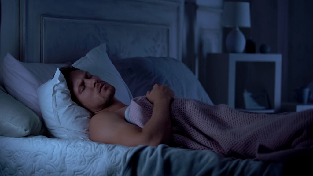 Sleep Paralysis Young man experiencing sleep paralysis.